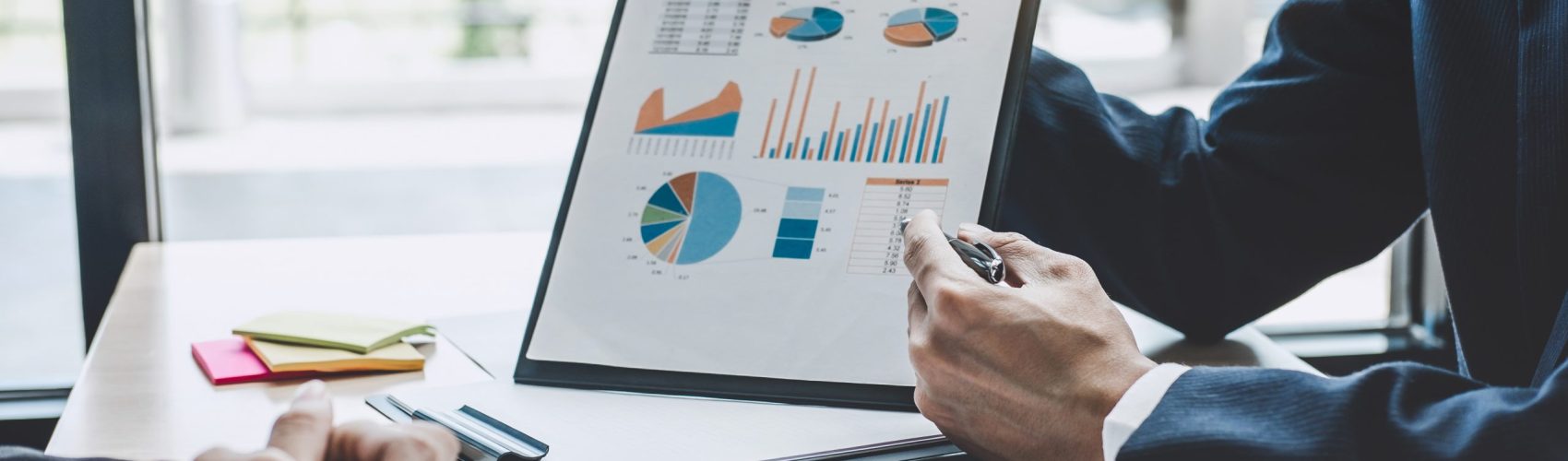 Finance manager meeting discussing company growth project success financial statistics, professional investor working start up project for strategy plan with document, laptop and digital tablet.